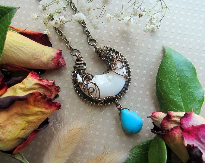 Necklace "La Luna" with carved bone sleeping face crescent paired with turquoise color howlite teardrop charm. Custom chain length.