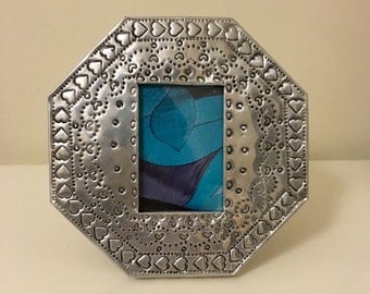 Hand stamped metal picture frame