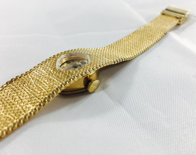 Storewide 25% Off SALE Vintage Gold Tone Swiss Made Chateau Mechanical Watch Featuring Woven Mesh Band With Sunken Bezel Design