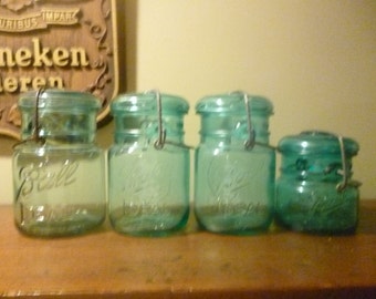 Set of 4 Vintage Lidded Ball Jars