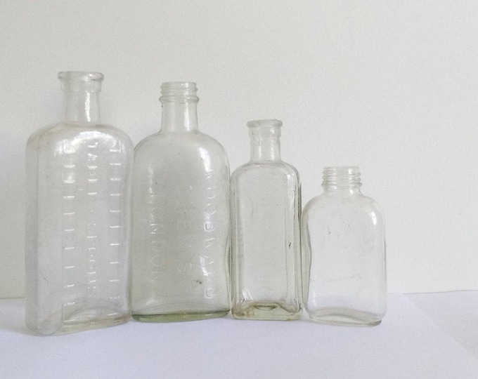Antique glass bottles, vintage clear bottles set of 4, collectible bottles, rustic kitchen decor, iridescent bottles in different sizes