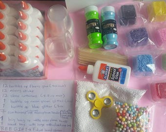 DIY Slime kit for slime sellers or for kids parties. Contains glue, glitter, containers, foam balls. Free fidget spinner with purchase