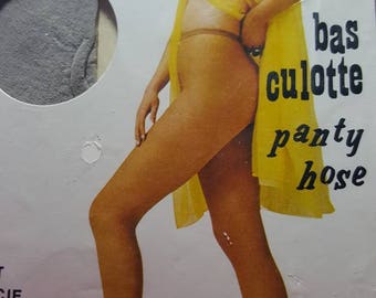 60s panty hose ,unopened package ,one size silver nylons
