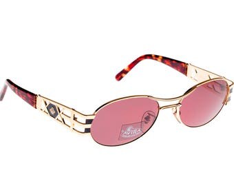 Von Furstenberg vintage sunglasses 80s, made in Italy. Gold metal oval sunglasses with double bar on top, unisex