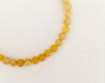 Dainty Yellow jadeite gemstone beaded bracelet. Simple everyday jewelry.