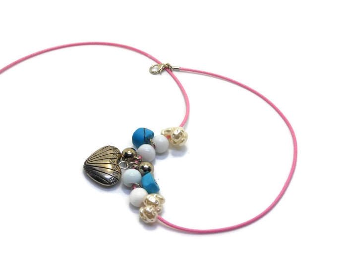 Heart necklace, silver tone heart charm and beads, white cats eye beads, turquoise chips and faux pearls on pink cording