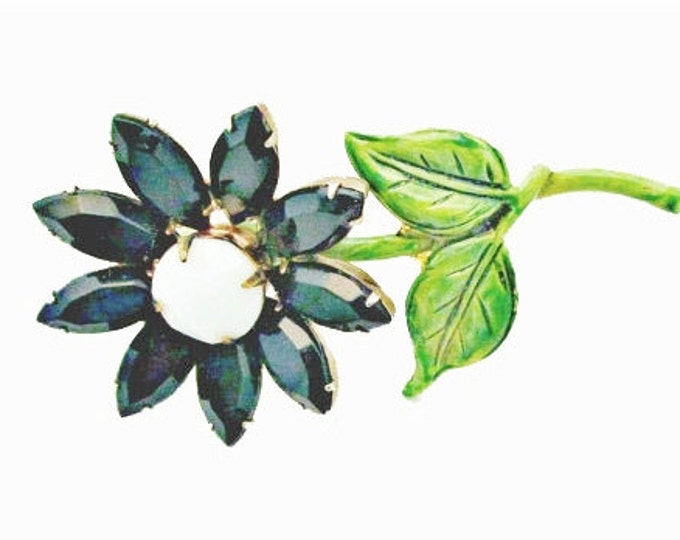 Flower Brooch with black and white glass and green enamel pin