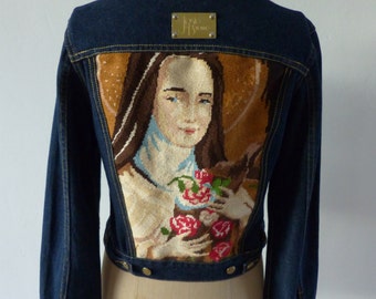 Jeans jacket with vintage tapissery a portrait of a Santa Teresa