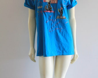 90's Vintage Coyote Pueblo Southwest Cut-Out Glitter Paint Electric Blue Oversize Sedona Mom Shirt