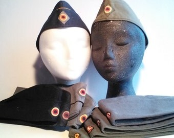 West German military caps in dark blue,grey, and green