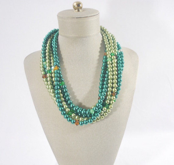 Green multi color multi strands beads with crystals highlights