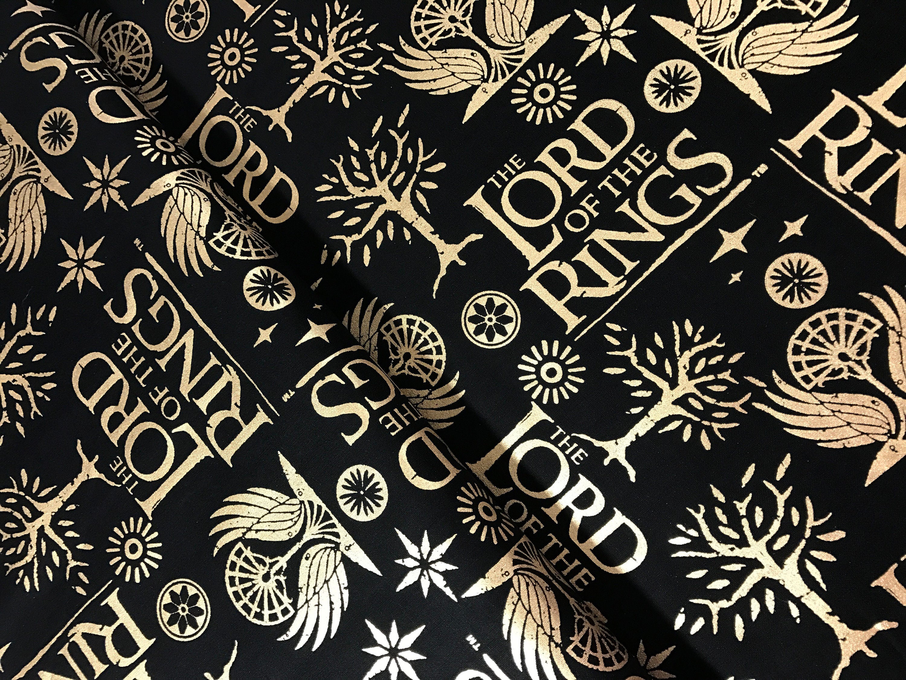 Lord of the Rings Metallic Cotton Fabric from Camelot Fabrics