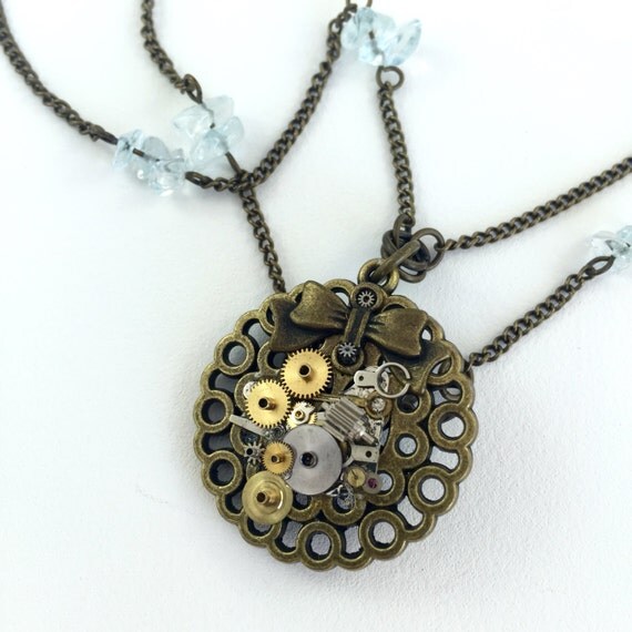 Steampunk Bow Pendant on Long Chain with Aquamarine Chips by AdornmentStudio steampunk buy now online Steampunk Bow Pendant on Long Chain with Aquamarine Chips by AdornmentStudio steampunk buy now online