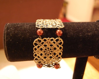 Handcrafted Bracelet- Linked Flowered Squares