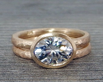 Oval Moissanite Engagement Ring and Wedding Band - Forever One, in Recycled 14k Yellow Gold, Matte, Hammered, Peekaboo Bezel, Made to Order