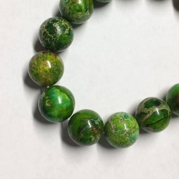 Items similar to Green Imperial Jasper 10mm - 12 pieces on Etsy
