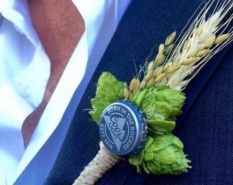 Boutonniere, hops with bottle cap, wheat and wild rice