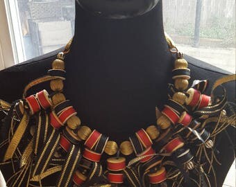 Showstopping handmade cottonreel necklace!