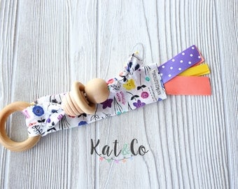 Ready to ship Natural maple teething ring in organic purple floral fabric. Can be personalized.