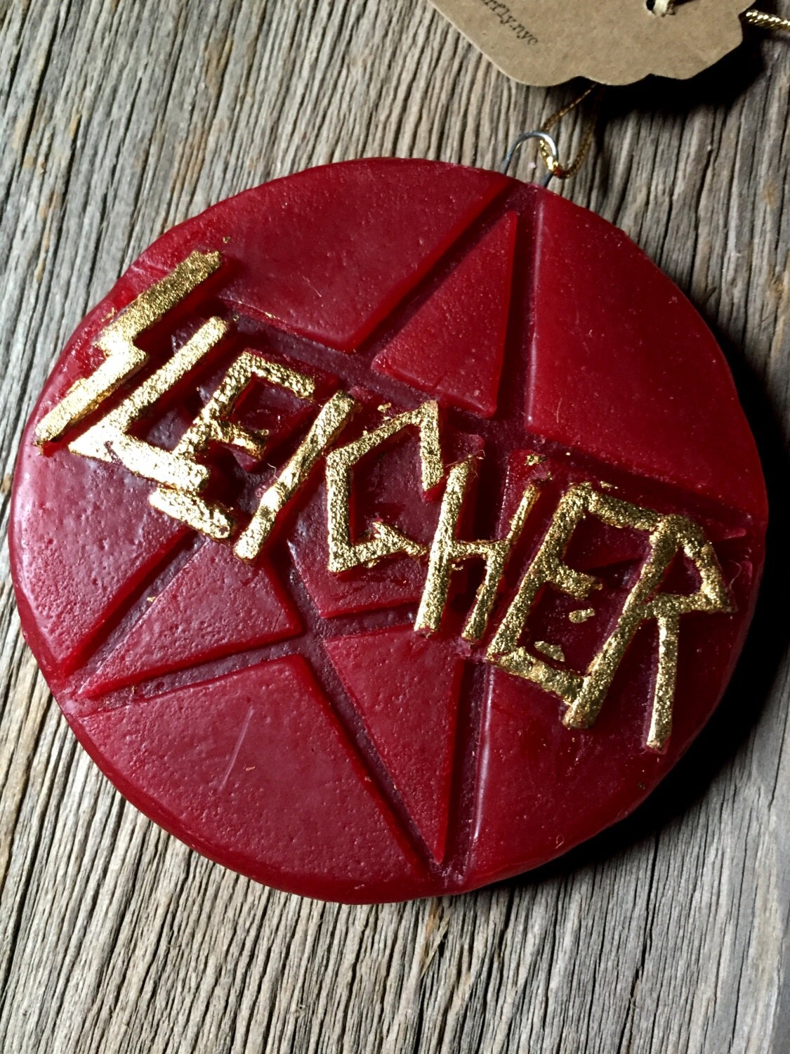 handmade embellished wax ornament that puts the by dogbutterfly