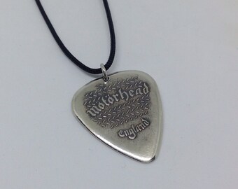 Handmade silver guitar pick