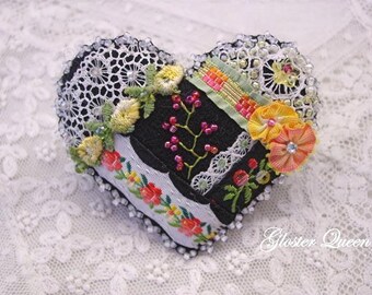 Black crazy quilt pin with some really pretty vintage ribbon and lace trims
