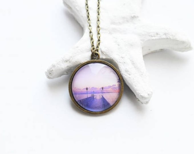 NATURE Round pendant metal brass with a picture of a purple sunset/sunrise under glass