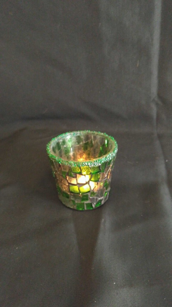 Stained glass mosaic candle holder in green and gray.
