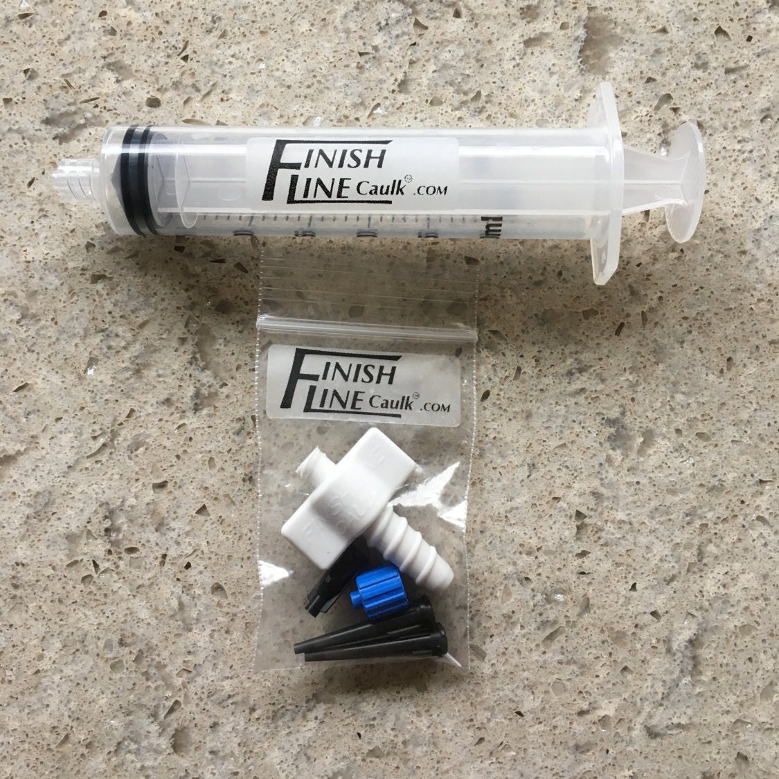 Finish Line Caulking Tool. Filled syringes can be used for