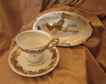 VTG set 3 Pieces Oval flat Cup and saucer VINTAGE Cup And Saucer 50th Anniversary VTG 3 piece With Gold Bell For 50 th Anniversary