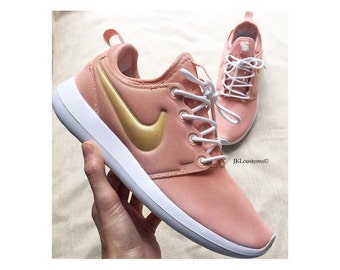 rose gold pink nike shoes