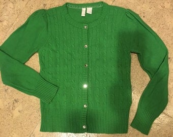Girls 1990's emerald colored cable knit cardigan sweater.