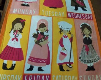 A large linen cotton tea towel of Monday to Sundays children nursery rhyme