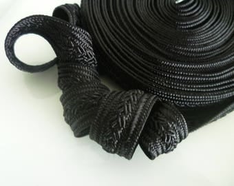 Black art silk trim, medium, raised pattern, 5 metres