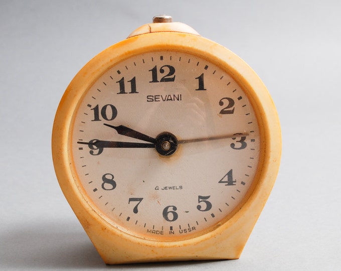 Vintage metal mechanical alarm clock Sevani from Soviet Russia