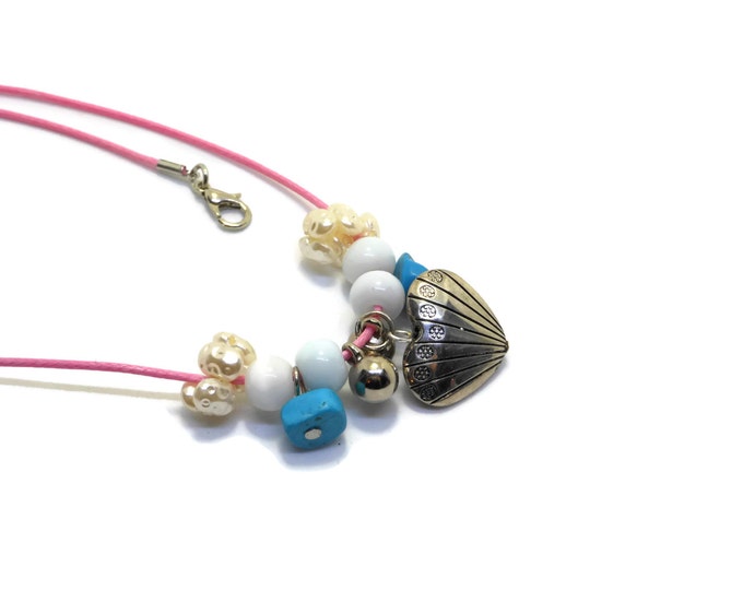 Heart necklace, silver tone heart charm and beads, white cats eye beads, turquoise chips and faux pearls on pink cording