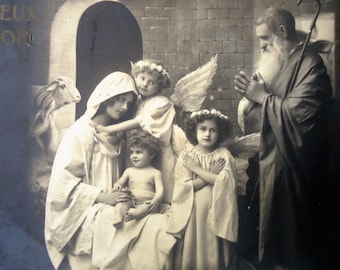 Antique Christmas postcard - Nativity baby Jesus crib angels, girls children wings flower crown, Mary Joseph sheep, french sepia tinted 1910