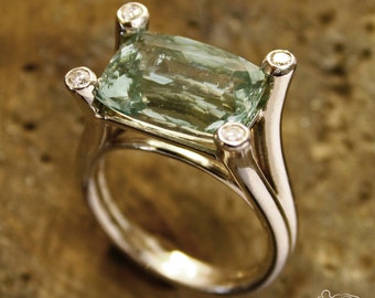 White gold ring with green beryl and diamonds