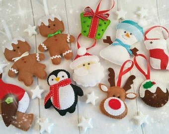 Felt Christmas decorations, Father Christmas, Snowman, gingerbread man/woman, reindeer, pudding, present, robin, stocking and penguin