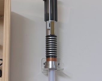 Lightsaber holder/vertical wall style/clear acrylic for Master Replicas and others. Cat# 1001