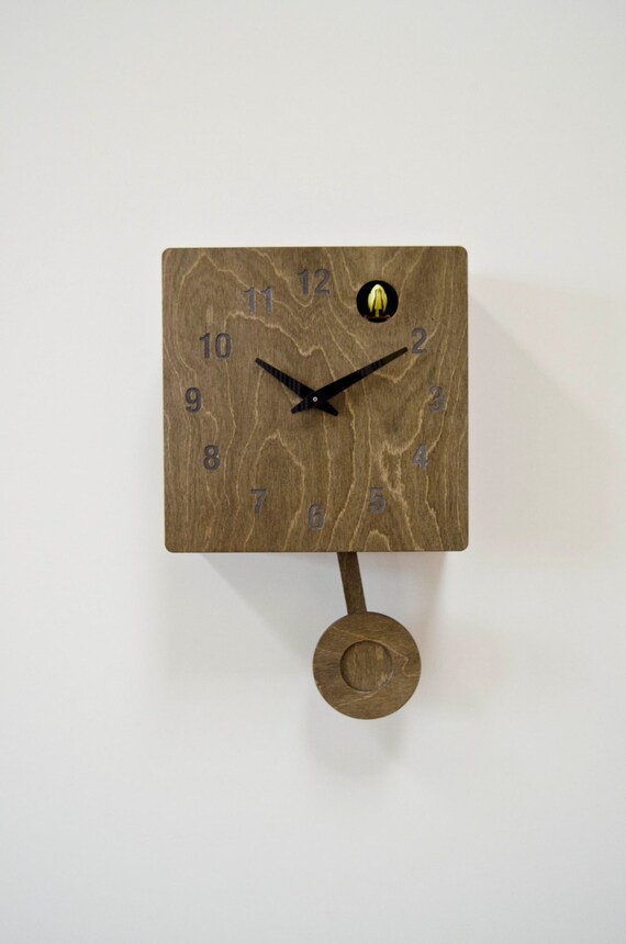 Tudor Oak Cuckoo Clock with moving pendulum