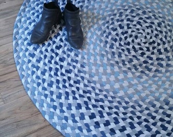 denim blue and gray chindi style braided rug created from new and recycled t shirts