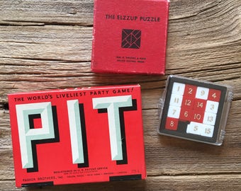 vintage puzzles/games PIT, The Elzzup Puzzle, and Lowe's 15 Puzzle