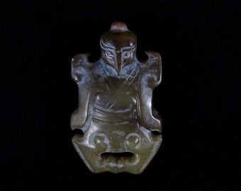 Carved jade pendant