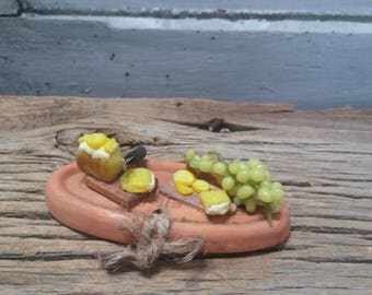 scene with lemon cake and grapes