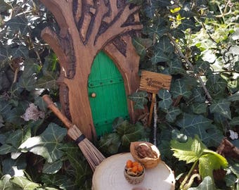 Magical Green Fairy Door complete with Fairies Welcome Sign, Broom, Table, Acorn Bowl, Acorn Cup and Walnut Basket.