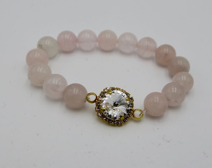 Natural heart healing rose quartz beaded stretch bracelet with Swarovski rivoli crystal set around a halo of pave crystal.