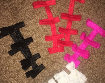 Footless gladiator sandals in pink black red and white