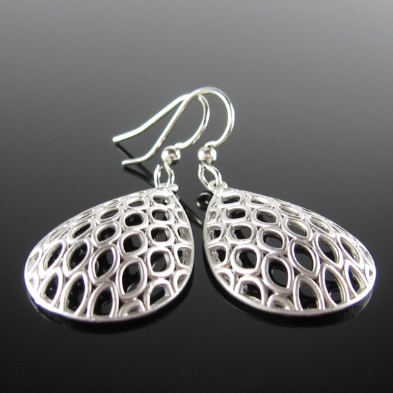 Items similar to Unique dangle earrings, surgical steel earrings