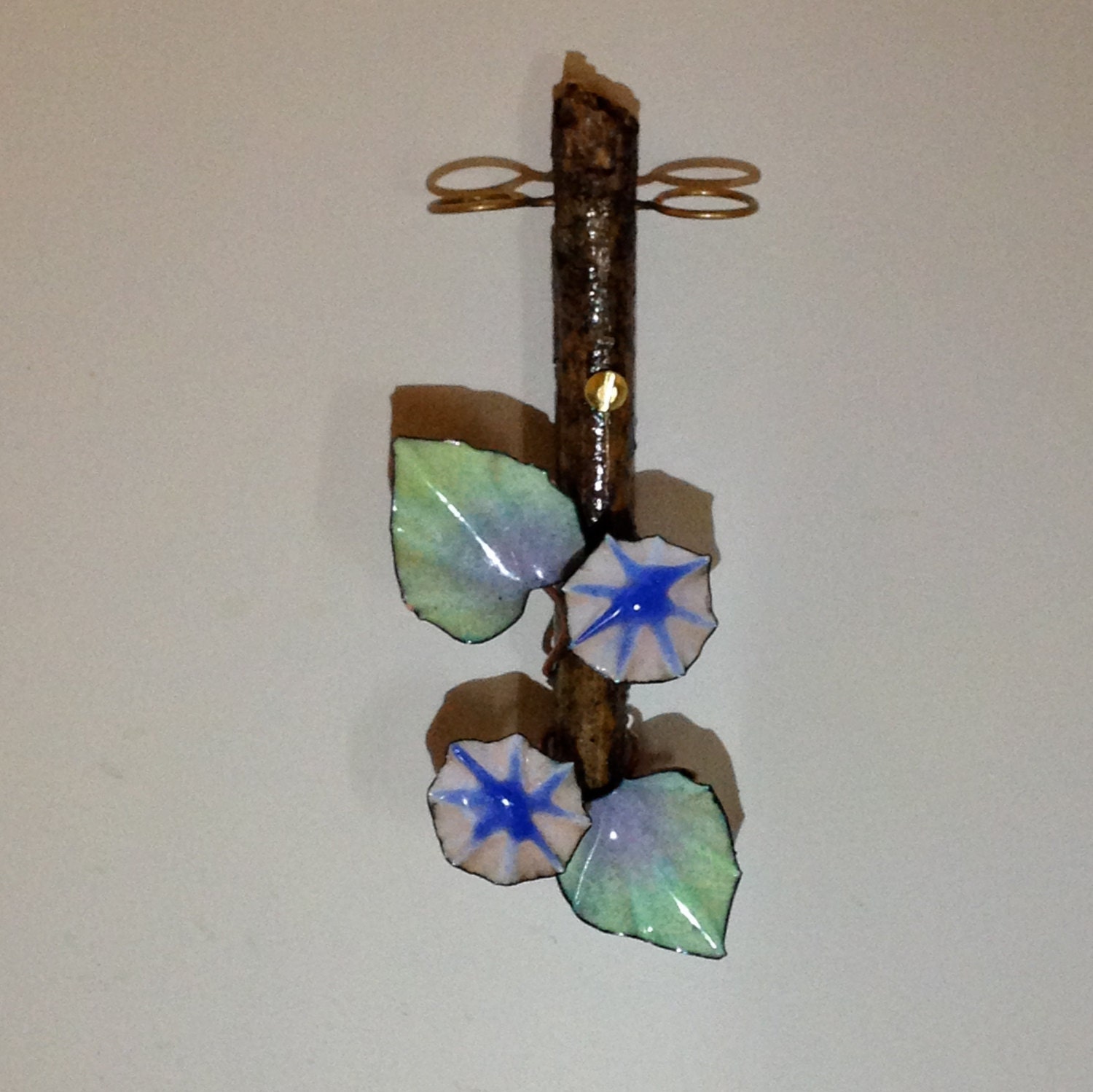 Unique toothbrush holder with blue and white flowers in wood